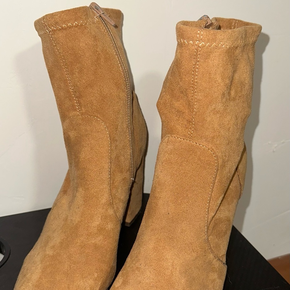 Brown suede high-heeled ankle boots, worn rarely, in good condition.